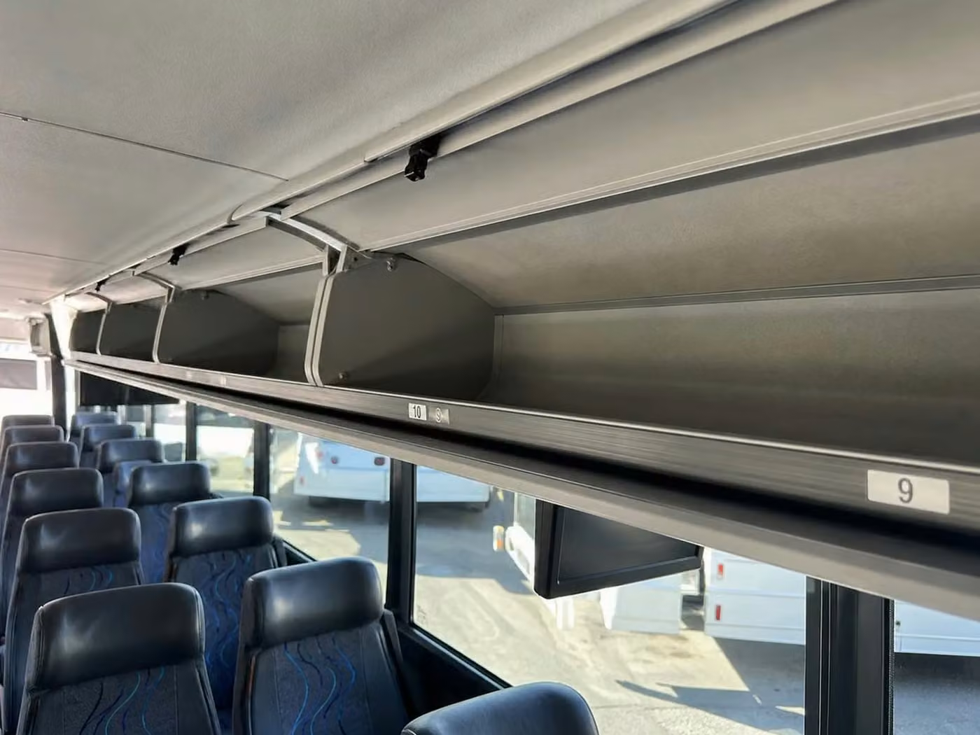 gary 25 passenger minibus overhead storage