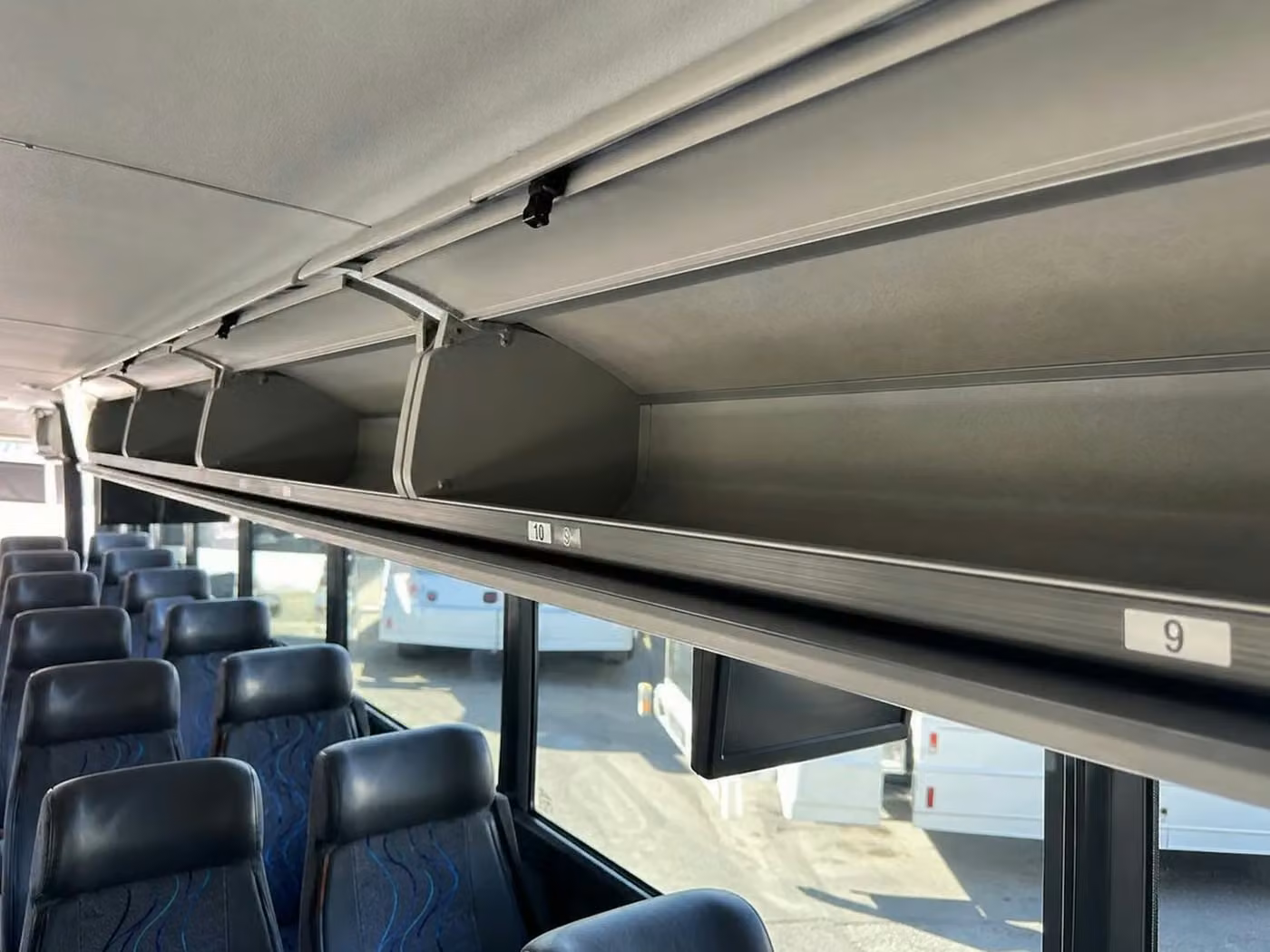 gary 28 passenger minibus overhead storage