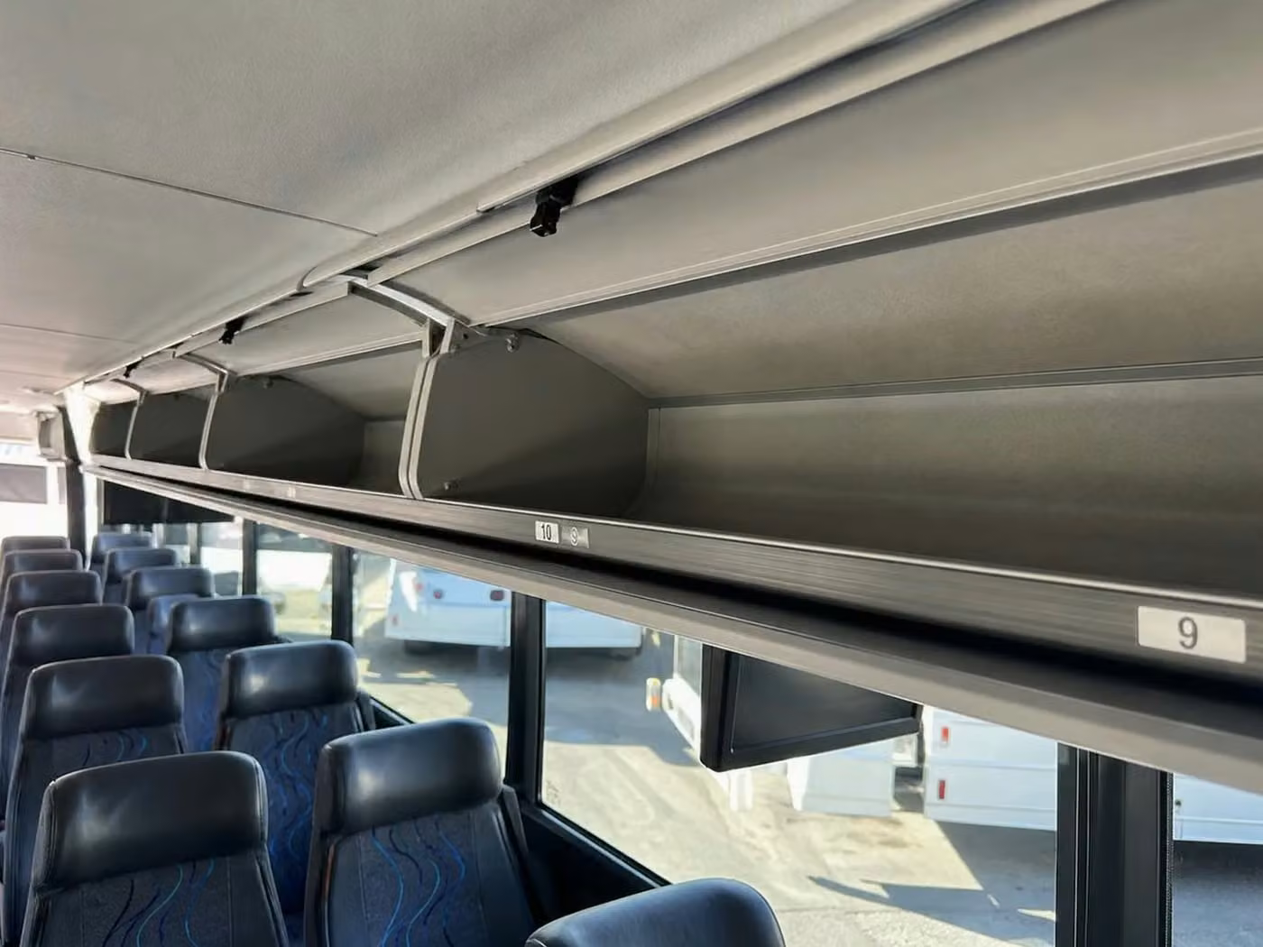 gary 56 passenger charter bus overhead storage